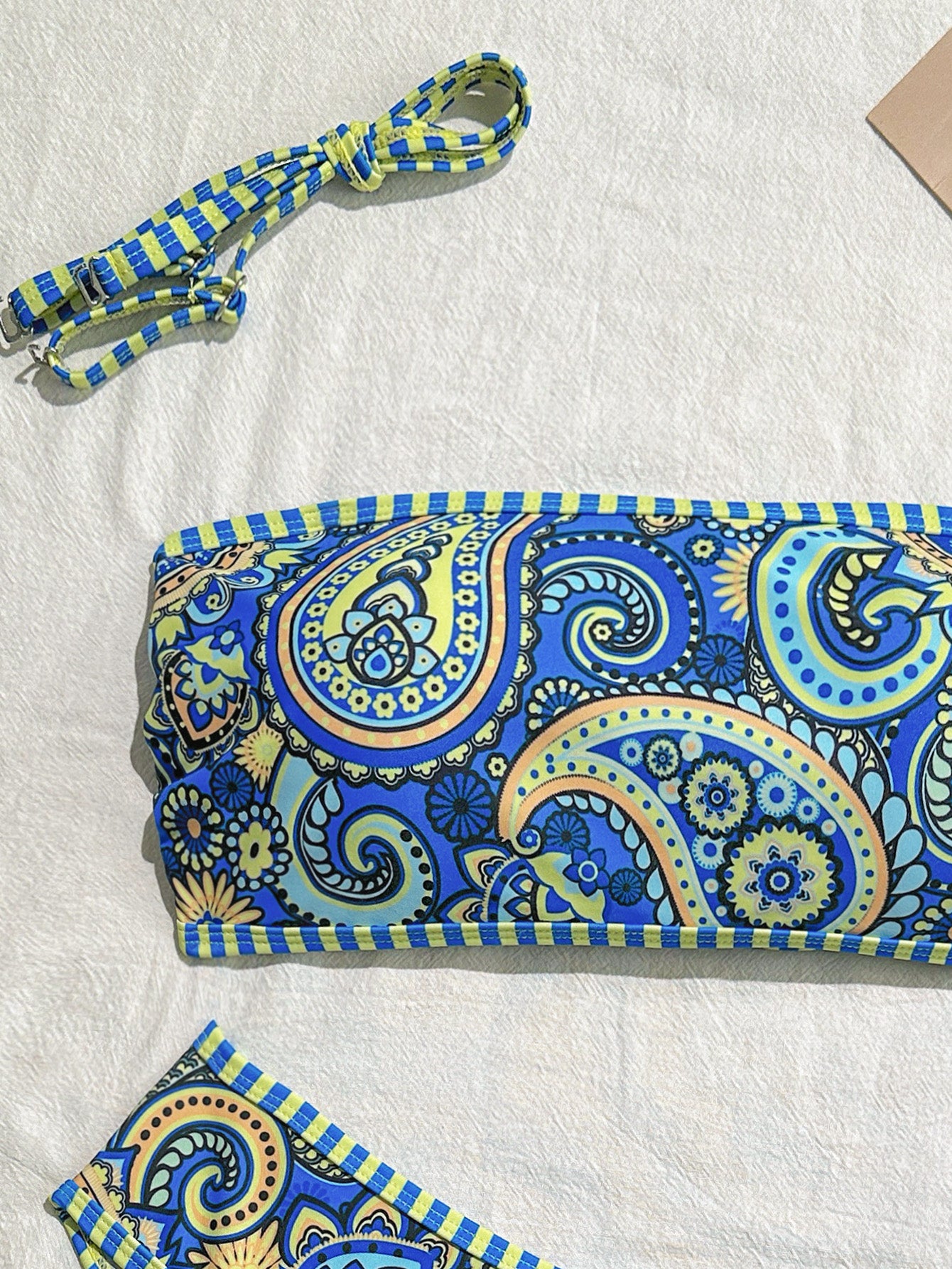 Vibrant Blue and Yellow Paisley Print Two-Piece Swimsuit with Tie-Front Design