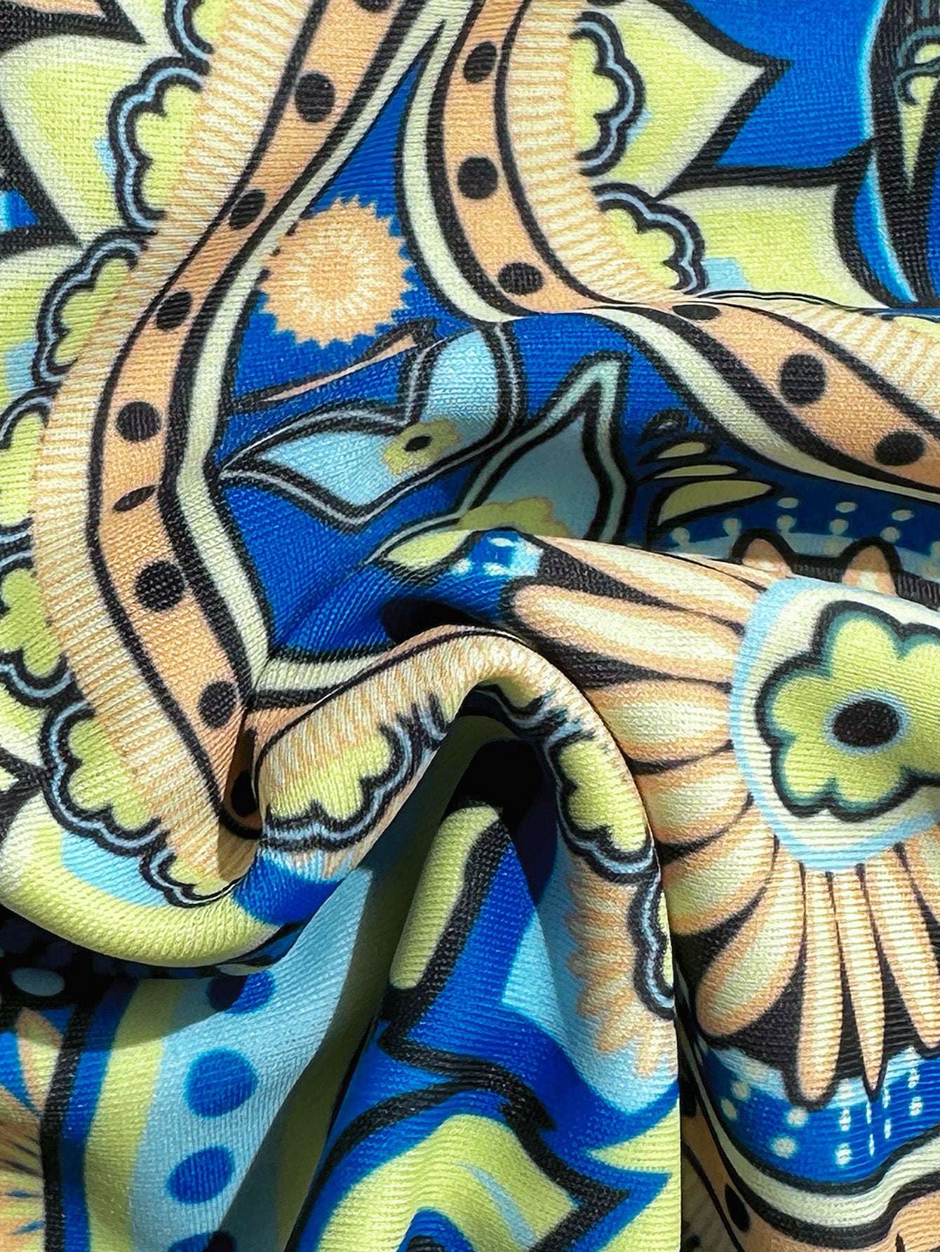 Vibrant Blue and Yellow Paisley Print Two-Piece Swimsuit with Tie-Front Design
