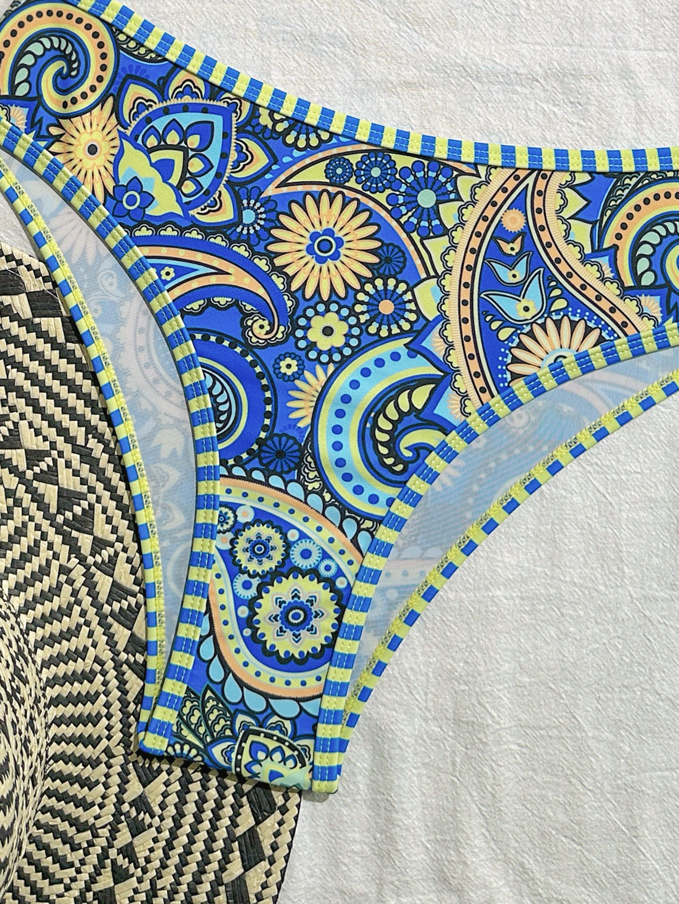 Vibrant Blue and Yellow Paisley Print Two-Piece Swimsuit with Tie-Front Design
