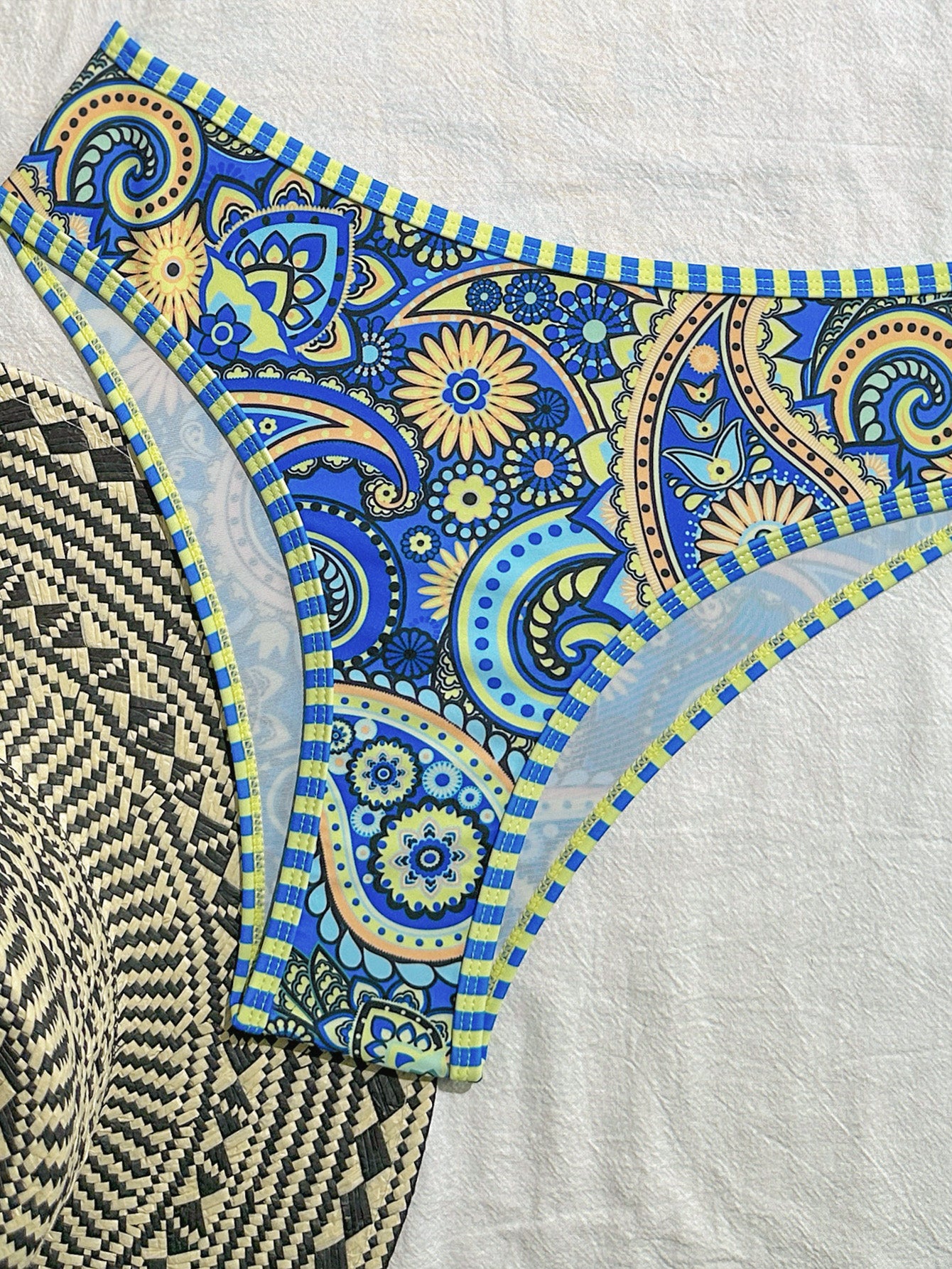 Vibrant Blue and Yellow Paisley Print Two-Piece Swimsuit with Tie-Front Design