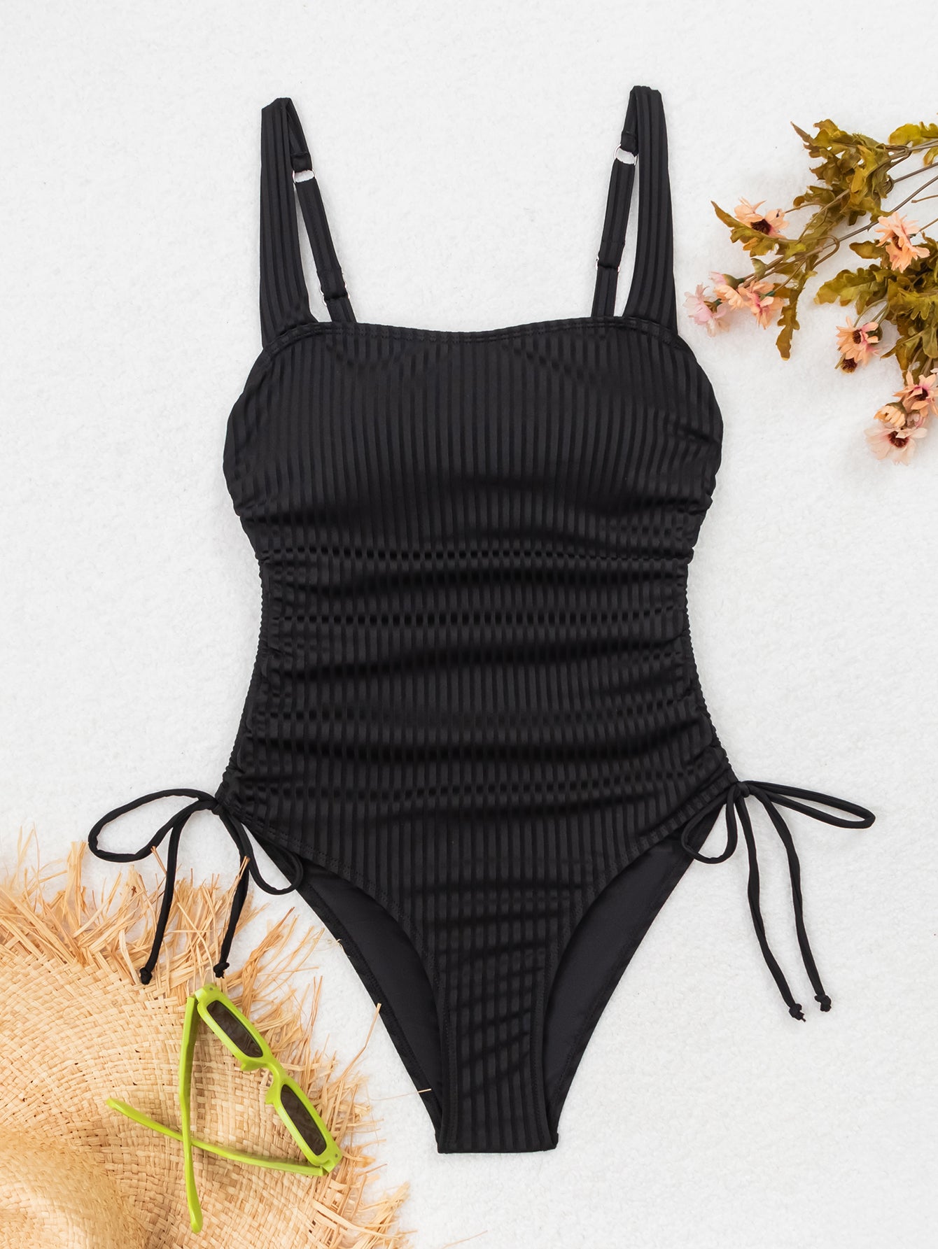 Sleek Black Ribbed One-Piece Swimsuit with Adjustable Side Ties for Women